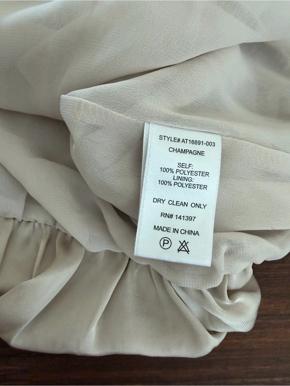 ASTR Champagne Cream Bubble-Hem Pleated V-Neck Blouse